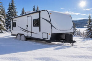 An RV parked in snow for the winter